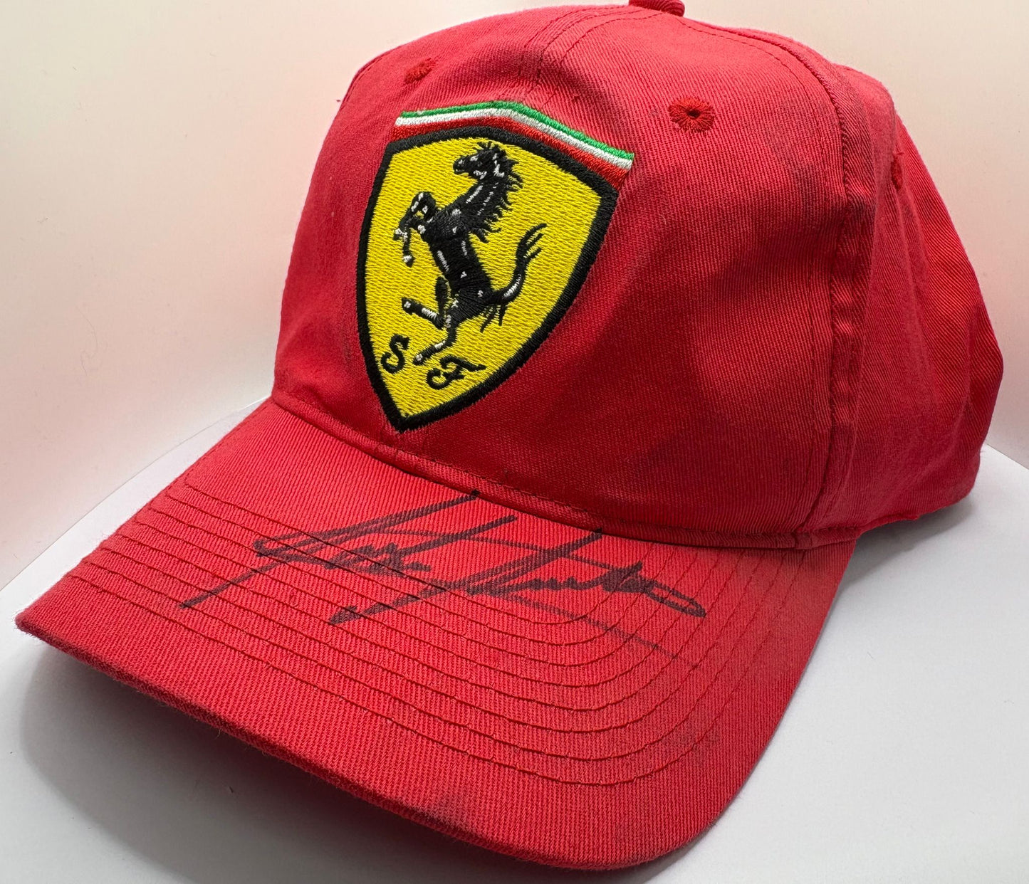 John Surtees - British Racing Legend & Motorcycle Driver Signed Red Ferrari F1 Cap with COA