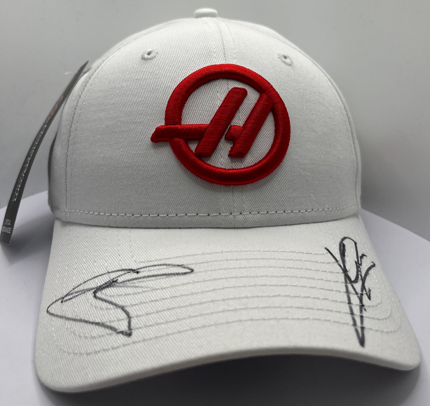 Kevin Magnussen & Ollie Bearman - Formula One MoneyGram Haas Drivers Signed White & Red F1 Cap with COA