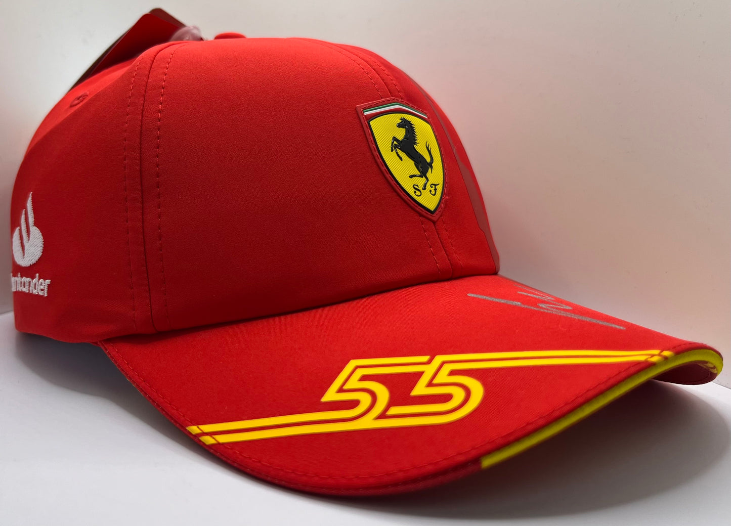 Carlos Sainz Signed (In Silver) Red & Yellow Ferrari F1 Cap with COA