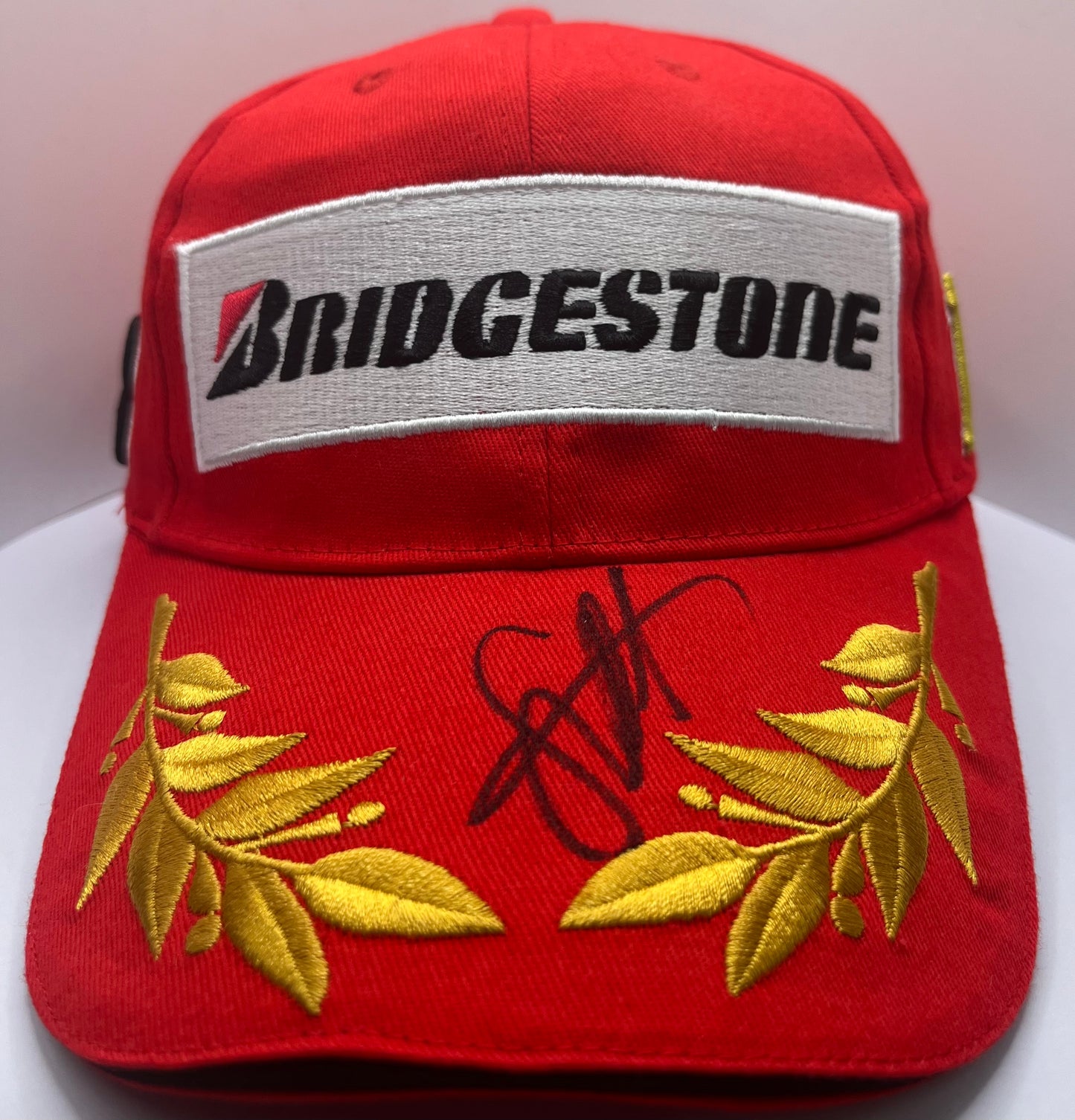 Sebastian Vettel - Formula One Racing Driver Signed Bridgestone Podium F1 Cap with COA