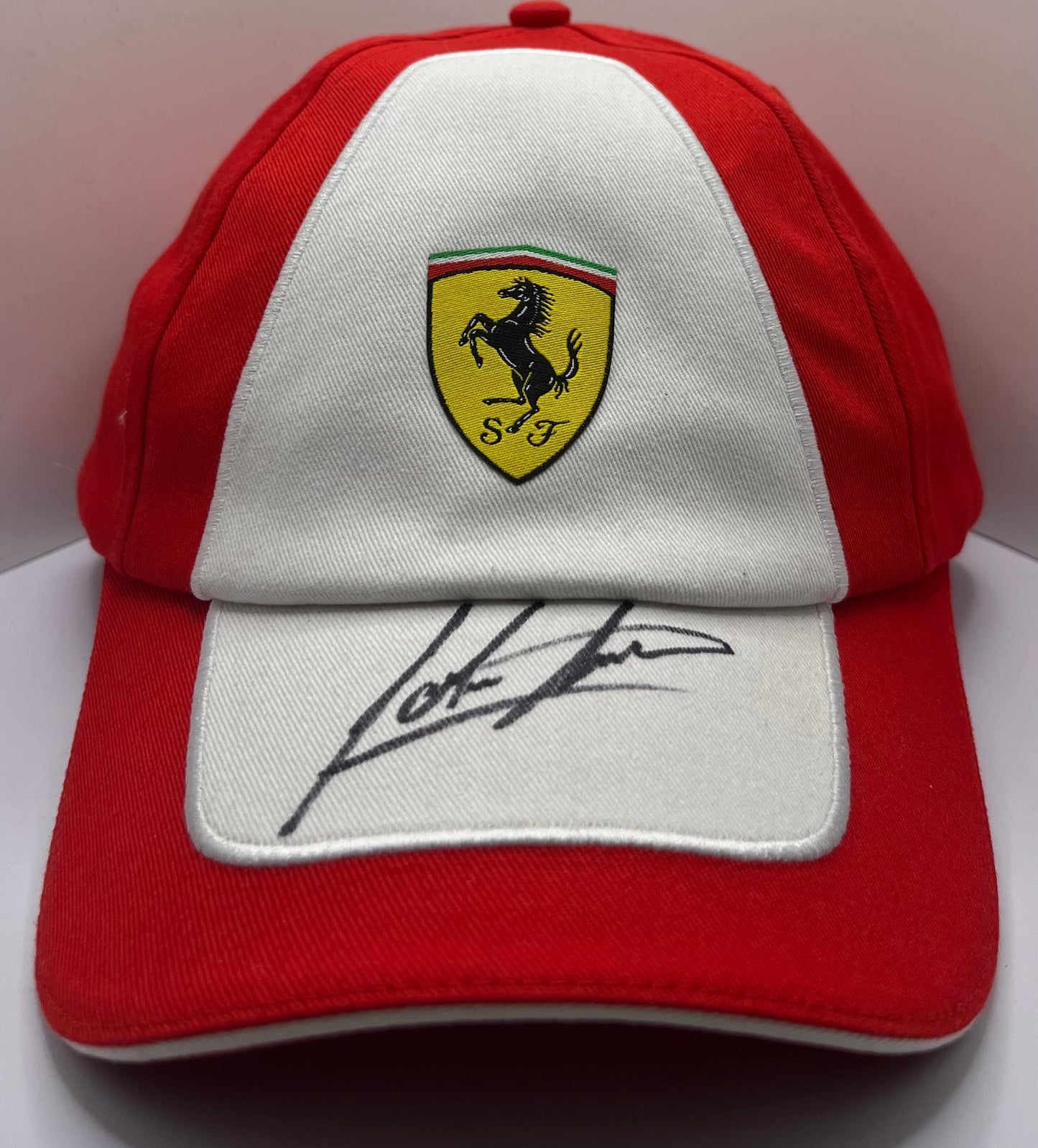 John Surtees - British Racing & Motorcycle Driver Signed Red & White Ferrari F1 Cap with COA