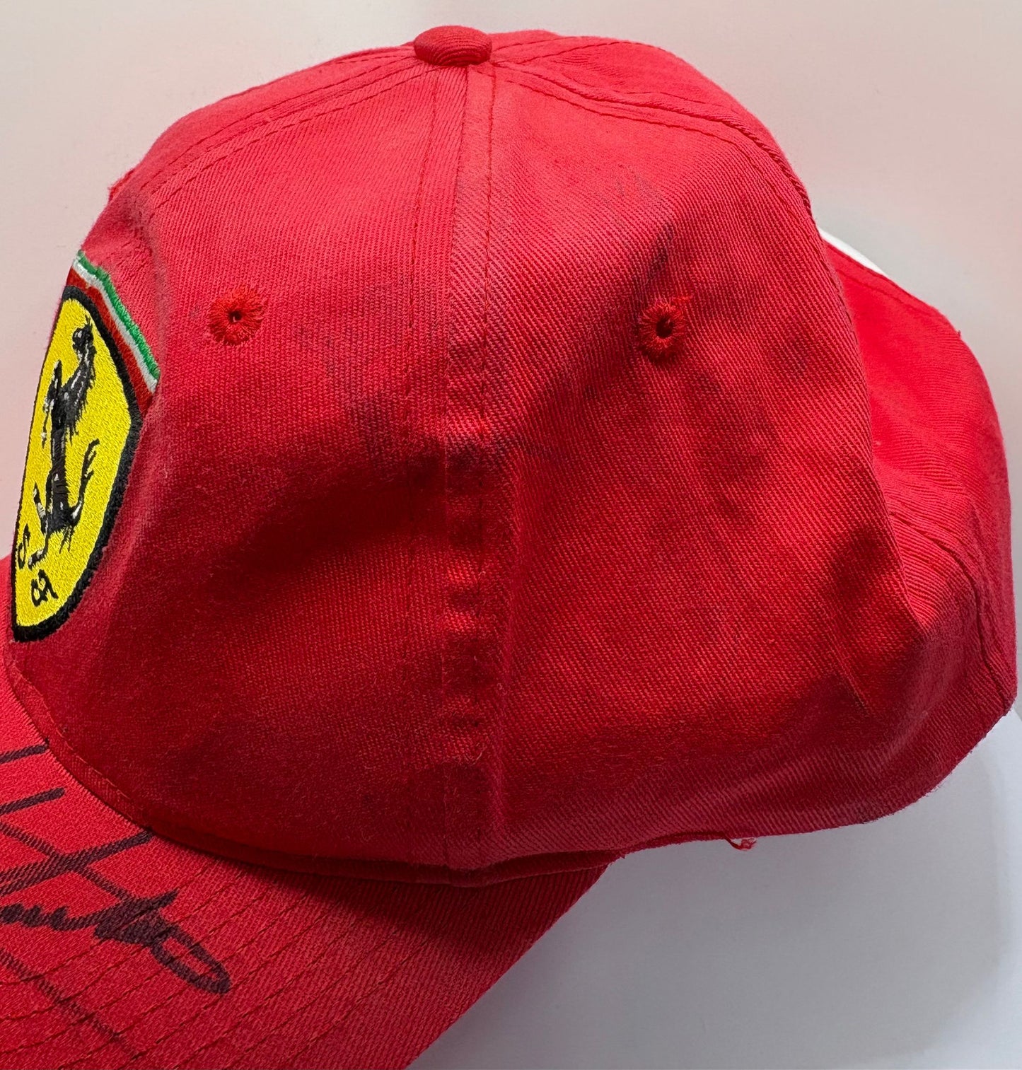 John Surtees - British Racing Legend & Motorcycle Driver Signed Red Ferrari F1 Cap with COA